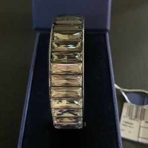 Authentic Swarovski Ombré Bangle with hinge latch.
